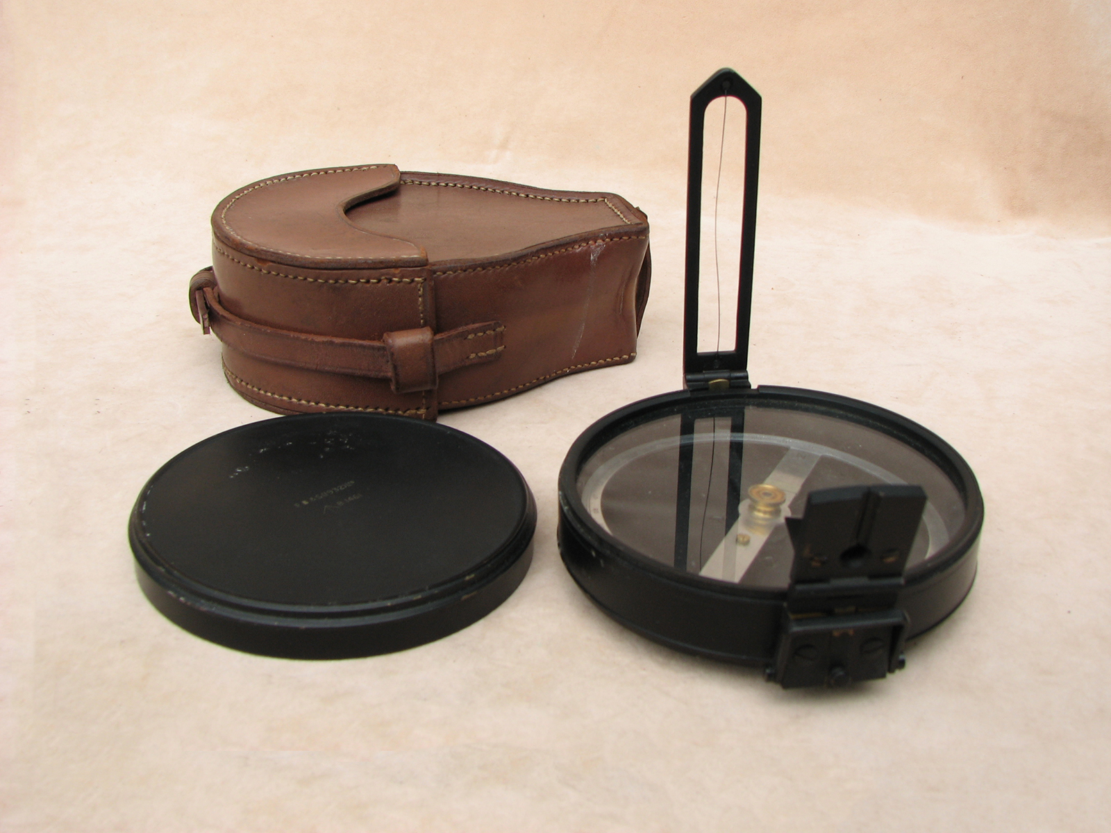 WW2 Francis Barker artillery compass with leather case.